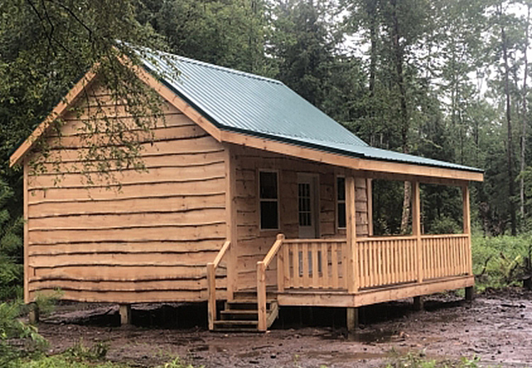 thumbnail image of land and cabin package camp ohara image of cabin with porch from land and camps