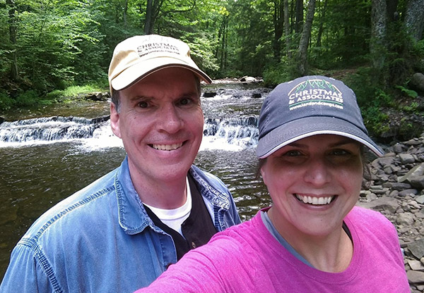 Camping Pictures ny Couple At River From Land And Camps