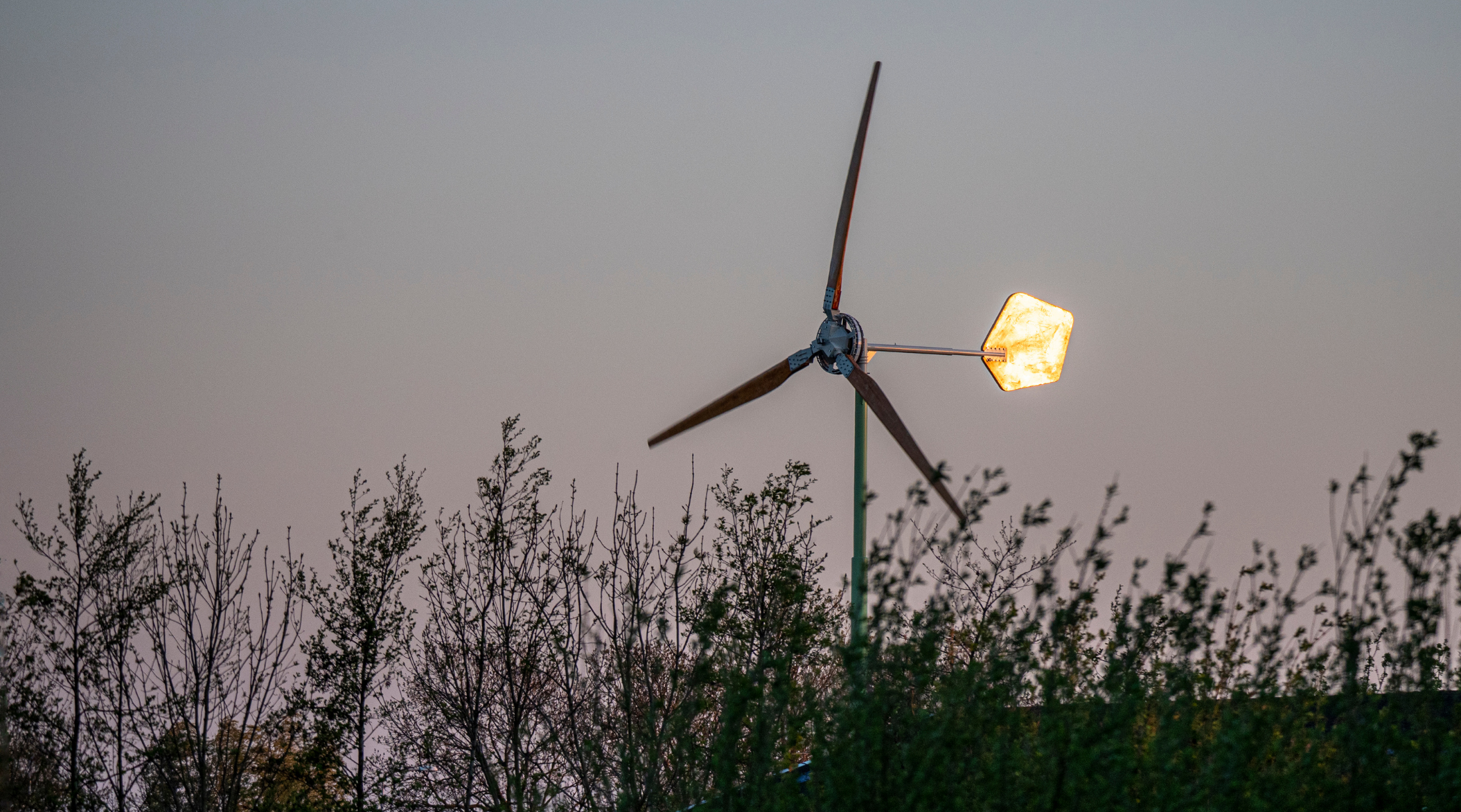 Windmill swaying in the breeze in ny state example of how to outfit your off grid cabin