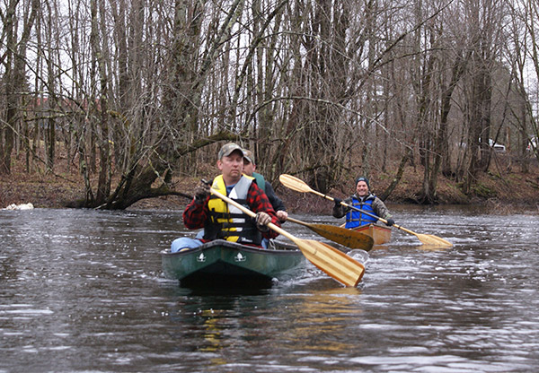 off the grid property for sale new york image of people canoing on river on private land