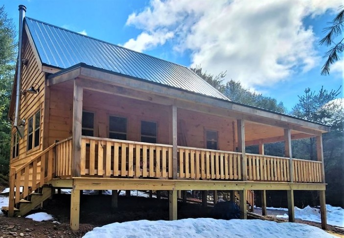 cabins for sale upstate ny image of cabin with wraparound porch and sunny sky